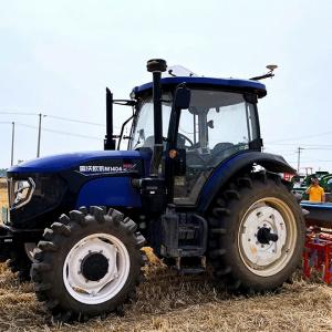 70 year old men and women chasing the wheat harvest with cameras